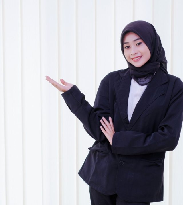 happy business woman showing something